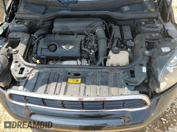 2012 MINI Countryman S with VIN WMWZC3C59CWL87444, listed as a Copart auction lot 59547785 with 147,814 mi miles and Salvage title. Bid and sale history available at DreamBid. Image 11.