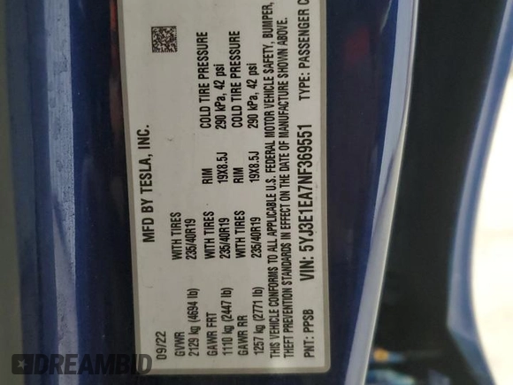 2022 Tesla Model 3 with VIN 5YJ3E1EA7NF369551, listed as a Copart auction lot 55610805 with 128,311 mi miles and Clean Title. Bid and sale history available at DreamBid. Image 12.