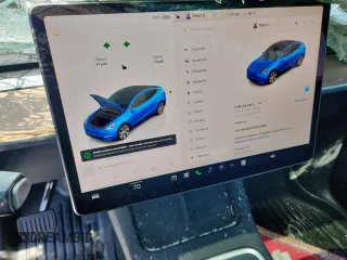 2024 Tesla Model Y Long Range z VIN 7SAYGDEE3RA238059, wystawiony jako Copart lot #61395925 z przebiegiem 14 991 mil mil oraz Szkoda całkowita • Salvage title. Historia ofert i sprzedaży dostępna na DreamBid. Obrazek 9.