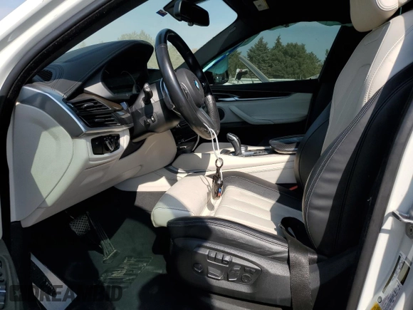 2018 BMW X6 xDrive50i with VIN 5UXKU6C56J0Z66652, listed as a Copart auction lot 74816694 with 56,229 mi miles and Salvage Title. Bid and sale history available at carsss.com. Image 7.