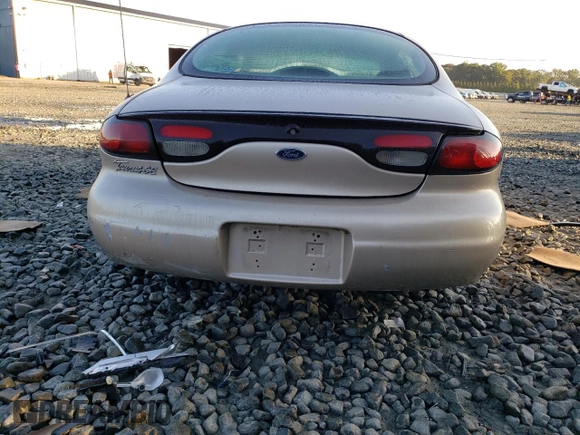 1999 Ford Taurus SE z VIN 1FAFP53U9XG107489, wystawiony jako Copart lot #69576093 z przebiegiem 86 262 mil mil oraz Szkody całkowita. Historia ofert i sprzedaży dostępna na DreamBid. Obrazek 6.
