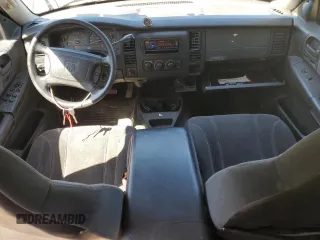 2001 Dodge Dakota Sport z VIN 1B7GG2AN81S113605, wystawiony jako Copart lot #58990065 z przebiegiem 243 919 mil mil oraz Tytuł czysty. Historia ofert i sprzedaży dostępna na DreamBid. Obrazek 8.