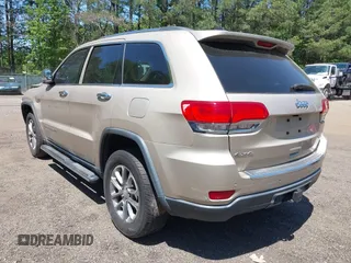 2015 Jeep Grand Cherokee Limited with VIN 1C4RJFBG2FC643264, listed as a IAAI auction lot 42151555 with 116,797 mi miles. Bid and sale history available at carsss.com. Image 3.