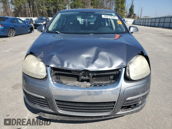 2007 Volkswagen Jetta 2.5 z VIN 3VWSF71K77M092907, wystawiony jako Copart lot #46819635 z przebiegiem 234 826 mil mil oraz Nie do naprawy • Non repairable. Historia ofert i sprzedaży dostępna na DreamBid. Obrazek 5.