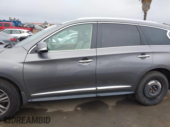 2019 Infiniti QX60 Luxe with VIN 5N1DL0MN9KC569666, listed as a IAAI auction lot 41904215 with 44,410 mi miles and . Bid and sale history available at DreamBid. Image 14.