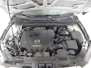 2014 Mazda 3 i Touring with VIN JM1BM1V70E1134498, listed as a IAAI auction lot 42495912 with 116,770 mi miles and . Bid and sale history available at DreamBid. Image 10.
