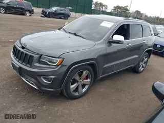 2014 Jeep Grand Cherokee Overland with VIN 1C4RJFCGXEC172008, listed as a IAAI auction lot 41719313 with 164,682 mi miles. Bid and sale history available at carsss.com. Image 17.