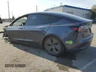 2023 Tesla Model 3 с VIN 5YJ3E1EA9PF412192, выставлен на аукционе Copart как лот 52122045 с пробегом 72 230 миль миль и Списание • Salvage title. История ставок и продаж доступна на DreamBid. Изображение 2.