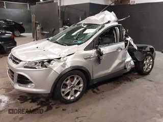 2016 Ford Escape Titanium with VIN 1FMCU9J94GUB00815, listed as a IAAI auction lot 40893687 with 152,891 mi miles. Bid and sale history available at carsss.com. Image 2.