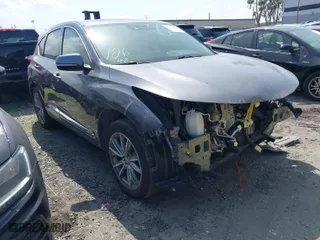2021 Acura RDX w/Technology Package with VIN 5J8TC1H59ML005505, listed as a IAAI auction lot 41571125 with 46,451 mi miles. Bid and sale history available at carsss.com. Image 1.