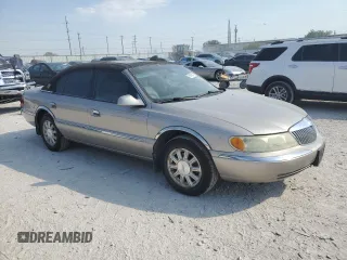 2002 Lincoln Continental with VIN 1LNHM97V32Y647800, listed as a Copart auction lot 75240874 with 71,689 mi miles and Salvage Title. Bid and sale history available at carsss.com. Image 4.