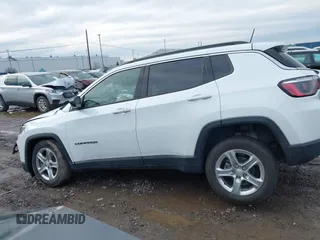 2023 Jeep Compass Latitude with VIN 3C4NJDBN6PT556992, listed as a IAAI auction lot 41226965 with 22,300 mi miles and . Bid and sale history available at DreamBid. Image 14.