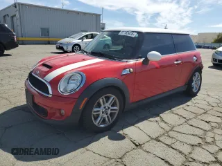 2011 MINI Hardtop S с VIN WMWSV3C50BTY12562, выставлен на аукционе Copart как лот 61183425 с пробегом 125 126 миль миль и Списание • Salvage title. История ставок и продаж доступна на DreamBid. Изображение 1.
