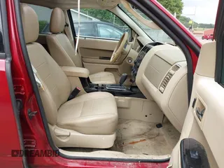 2010 Ford Escape Limited z VIN 1FMCU0EG5AKC21828, wystawiony jako IAAI lot #42343582 z przebiegiem 135 534 mil mil oraz . Historia ofert i sprzedaży dostępna na DreamBid. Obrazek 5.