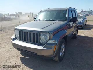 2012 Jeep Liberty Sport with VIN 1C4PJLAK7CW147270, listed as a IAAI auction lot 42016050 with 166,583 mi miles. Bid and sale history available at carsss.com. Image 6.