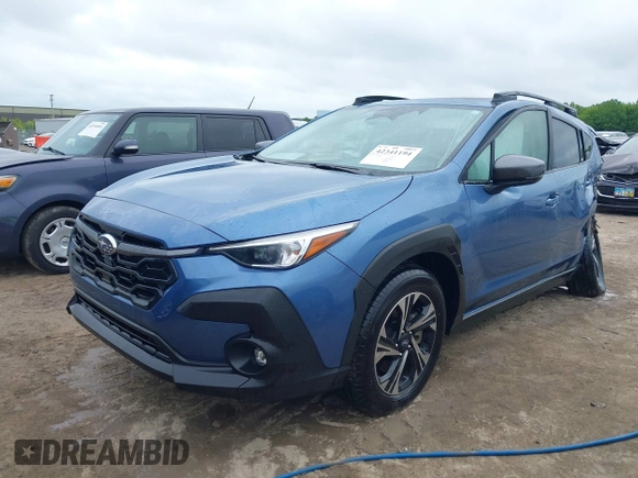 2024 Subaru Crosstrek Premium z VIN JF2GUADC6RH338290, wystawiony jako IAAI lot #42341194 z przebiegiem 10 379 mil mil oraz . Historia ofert i sprzedaży dostępna na DreamBid. Obrazek 2.