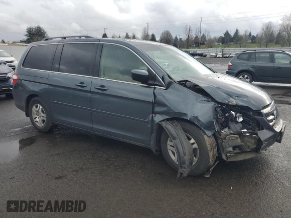 2005 Honda Odyssey EX-L with VIN 5FNRL38695B018174, listed as a Copart auction lot 45573885 with 207,393 mi miles and Salvage Title. Bid and sale history available at carsss.com. Image 4.