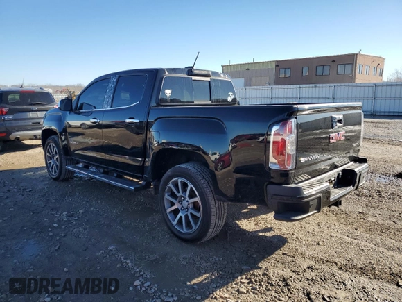 2020 GMC Canyon 4WD Denali with VIN 1GTG6EEN2L1131363, listed as a Copart auction lot 83033354 with 52,694 mi miles and Salvage Title. Bid and sale history available at carsss.com. Image 2.