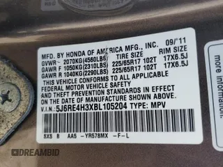 2011 Honda CR-V LX z VIN 5J6RE4H3XBL105204, wystawiony jako Copart lot #60571365 z przebiegiem 140 523 mil mil oraz Czysty tytuł • Clean title. Historia ofert i sprzedaży dostępna na DreamBid. Obrazek 14.