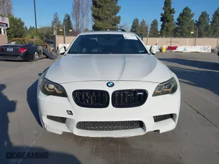 2014 BMW M5 with VIN WBSFV9C55ED593614, listed as a IAAI auction lot 41777369 with 144,076 mi miles. Bid and sale history available at carsss.com. Image 12.