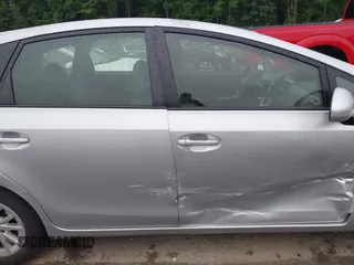 2014 Toyota Prius Two z VIN JTDZN3EU0EJ009210, wystawiony jako IAAI lot #42411066 z przebiegiem 124 588 mil mil oraz . Historia ofert i sprzedaży dostępna na DreamBid. Obrazek 13.