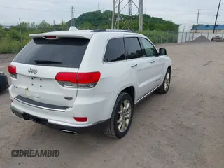 2014 Jeep Grand Cherokee Summit z VIN 1C4RJFJTXEC346627, wystawiony jako IAAI lot #42332200 z przebiegiem 231 007 mil mil oraz . Historia ofert i sprzedaży dostępna na DreamBid. Obrazek 4.