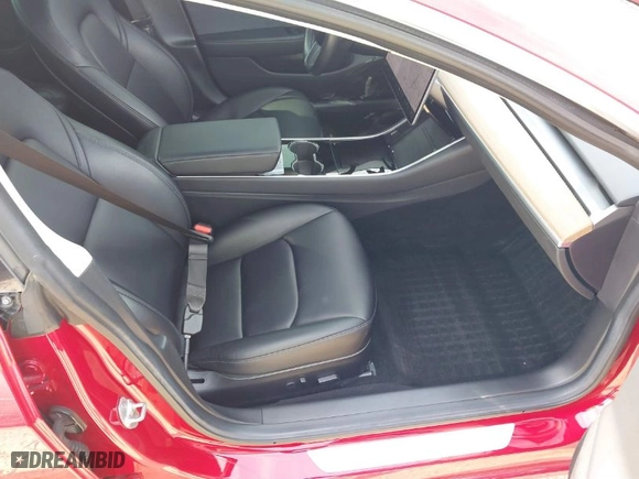 2018 Tesla Model 3 Long Range Battery with VIN 5YJ3E1EA4JF053227, listed as a IAAI auction lot 41854908 with 84,293 mi miles. Bid and sale history available at carsss.com. Image 5.