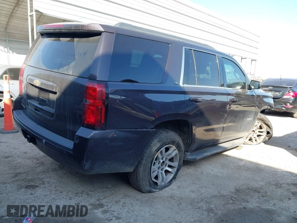 2015 Chevrolet Tahoe LS with VIN 1GNSCAKCXFR628303, listed as a IAAI auction lot 42002698 with 152,141 mi miles and . Bid and sale history available at DreamBid. Image 4.