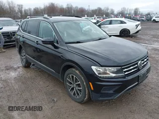 2018 Volkswagen Tiguan SEL z VIN 3VV2B7AX9JM192672, wystawiony jako IAAI lot #41956962 z przebiegiem 85 519 mil mil oraz . Historia ofert i sprzedaży dostępna na DreamBid. Obrazek 1.