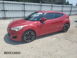 2012 Hyundai Veloster w/Black Int z VIN KMHTC6AD8CU075367, wystawiony jako Copart lot #62167065 z przebiegiem 186 356 mil mil oraz Czysty tytuł • Clean title. Historia ofert i sprzedaży dostępna na DreamBid. Obrazek 1.