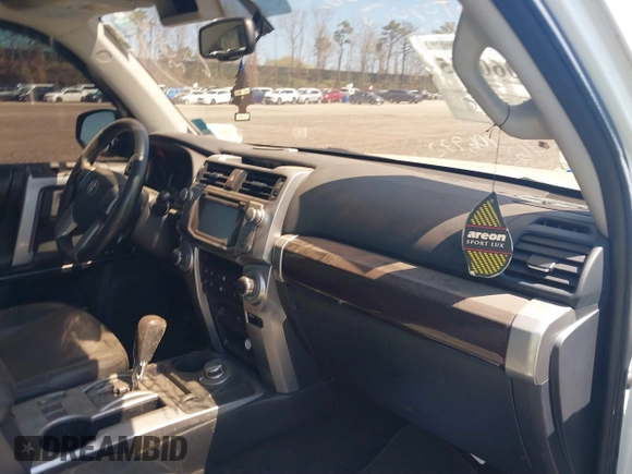 2016 Toyota 4Runner Limited with VIN JTEBU5JR9G5299522, listed as a IAAI auction lot 39205962 with 106,972 mi miles and . Bid and sale history available at DreamBid. Image 5.