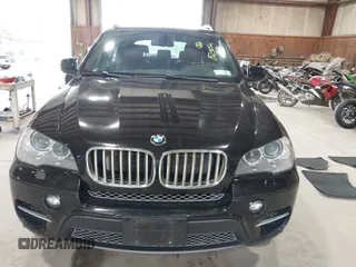 2012 BMW X5 50i with VIN 5UXZV8C50CL425721, listed as a IAAI auction lot 42590676 with 192,355 mi miles and . Bid and sale history available at DreamBid. Image 12.