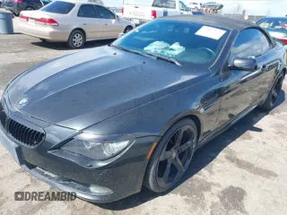 2009 BMW 6 Series 650i z VIN WBAEB53539CX64230, wystawiony jako IAAI lot #41827275 z przebiegiem 108 260 mil mil oraz . Historia ofert i sprzedaży dostępna na DreamBid. Obrazek 2.