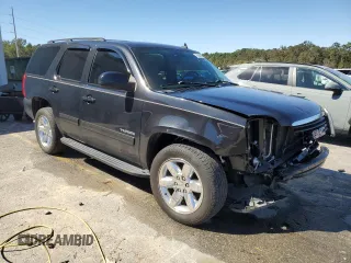 2011 GMC Yukon SLE with VIN 1GKS1AE02BR213992, listed as a Copart auction lot 75609704 with 133,536 mi miles and Salvage Title. Bid and sale history available at carsss.com. Image 4.