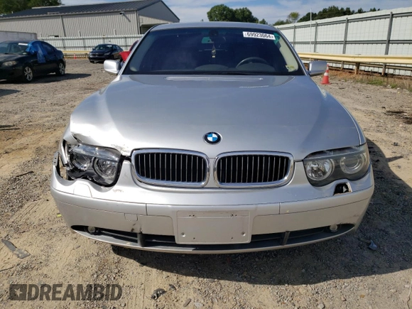 2003 BMW 7 Series 745i with VIN WBAGL63473DP68267, listed as a Copart auction lot 69923064 with 100,468 mi miles and Salvage title. Bid and sale history available at DreamBid. Image 5.