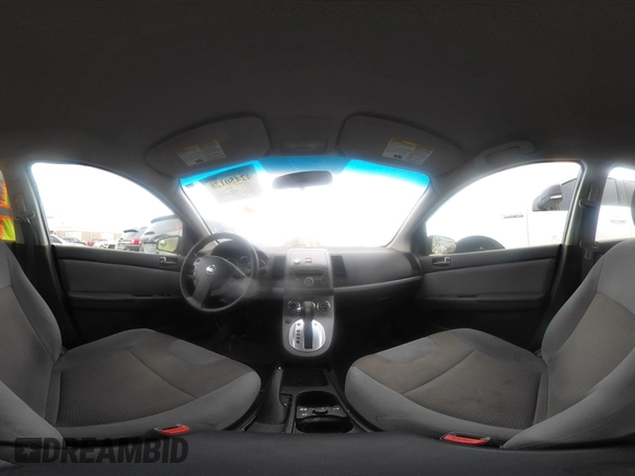 2010 Nissan Sentra S z VIN 3N1AB6AP1AL695996, wystawiony jako IAAI lot #42450128 z przebiegiem 199 606 mil mil oraz . Historia ofert i sprzedaży dostępna na DreamBid. Obrazek 18.