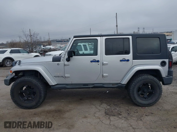 2008 Jeep Wrangler Unlimited Sahara с VIN 1J4GA59138L505460, выставлен на аукционе IAAI как лот 41846611 с пробегом 116 658 миль миль и . История ставок и продаж доступна на DreamBid. Изображение 14.