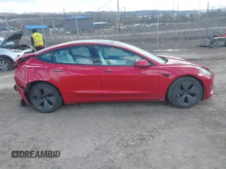 2021 Tesla Model 3 Long Range with VIN 5YJ3E1EB0MF902833, listed as a IAAI auction lot 41854474 with 41,982 mi miles and . Bid and sale history available at DreamBid. Image 13.