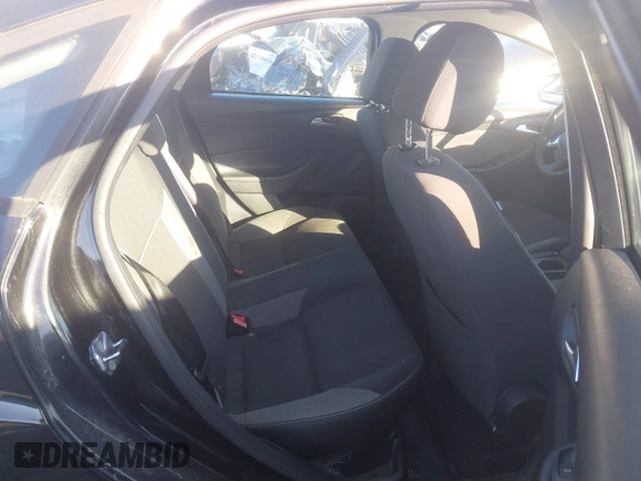 2013 Ford Focus SE z VIN 1FADP3F29DL216818, wystawiony jako IAAI lot #42347855 z przebiegiem 138 921 mil mil oraz . Historia ofert i sprzedaży dostępna na DreamBid. Obrazek 8.