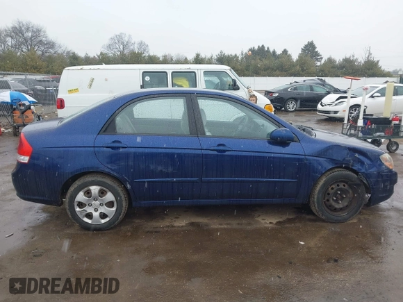 2009 Kia Spectra LX z VIN KNAFE221X95619246, wystawiony jako IAAI lot #41739339 z przebiegiem Nie podano mil oraz . Historia ofert i sprzedaży dostępna na DreamBid. Obrazek 13.