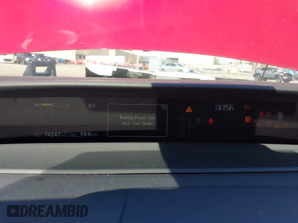 2021 Toyota Prius LE with VIN JTDKAMFP6M3192515, listed as a IAAI auction lot 42302003 with 74,247 mi miles and . Bid and sale history available at DreamBid. Image 7.
