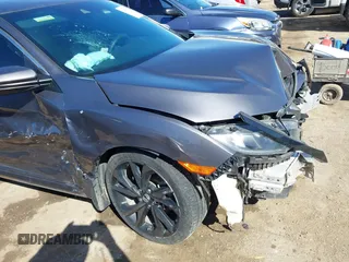 2019 Honda Civic Sport with VIN 19XFC2F82KE019704, listed as a IAAI auction lot 41770051 with 90,011 mi miles and . Bid and sale history available at DreamBid. Image 6.