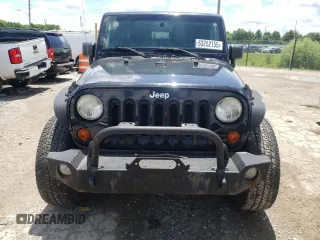 2011 Jeep Wrangler Sahara with VIN 1J4AA5D11BL528191, listed as a Copart auction lot 63252155 with 171,169 mi miles and Clean title. Bid and sale history available at DreamBid. Image 5.