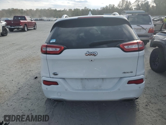 2018 Jeep Cherokee Overland with VIN 1C4PJMJX9JD594323, listed as a Copart auction lot 76238794 with 71,870 mi miles and Salvage Title. Bid and sale history available at carsss.com. Image 6.