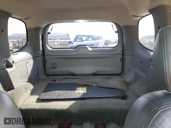 2003 GMC Envoy SLT with VIN 1GKDT13S732378731, listed as a Copart auction lot 88340825 with 125,814 mi miles and Salvage Title. Bid and sale history available at carsss.com. Image 10.