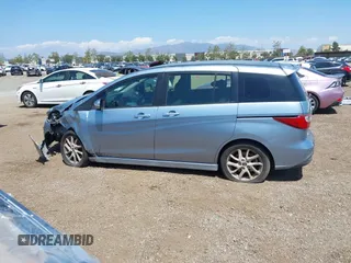 2013 Mazda 5 Touring with VIN JM1CW2CL8D0145628, listed as a IAAI auction lot 42148184 with 137,150 mi miles and . Bid and sale history available at DreamBid. Image 14.