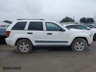 2006 Jeep Grand Cherokee Laredo with VIN 1J8GS48K16C348315, listed as a IAAI auction lot 41062772 with 239,662 mi miles. Bid and sale history available at carsss.com. Image 12.