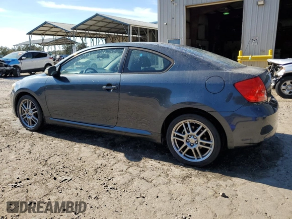 2007 Scion tC Spec with VIN JTKDE177170175677, listed as a Copart auction lot 80247084 with 236,238 mi miles and Salvage Title. Bid and sale history available at carsss.com. Image 2.