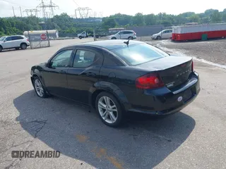 2013 Dodge Avenger SXT with VIN 1C3CDZCB7DN650959, listed as a IAAI auction lot 42592881 with 107,652 mi miles and . Bid and sale history available at DreamBid. Image 3.