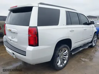 2018 Chevrolet Tahoe LT with VIN 1GNSCBKC5JR323595, listed as a IAAI auction lot 41550552 with 115,697 mi miles. Bid and sale history available at carsss.com. Image 4.